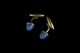 YELLOW METAL BLUE CHALCEDONY CUFFLINKS.total weight 7.39 gms.