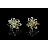 18CT DIAMOND SET OPEN BOW STUD EARRINGS,estimated total weight 1.00ct , 9ct backs 0.8 gms,