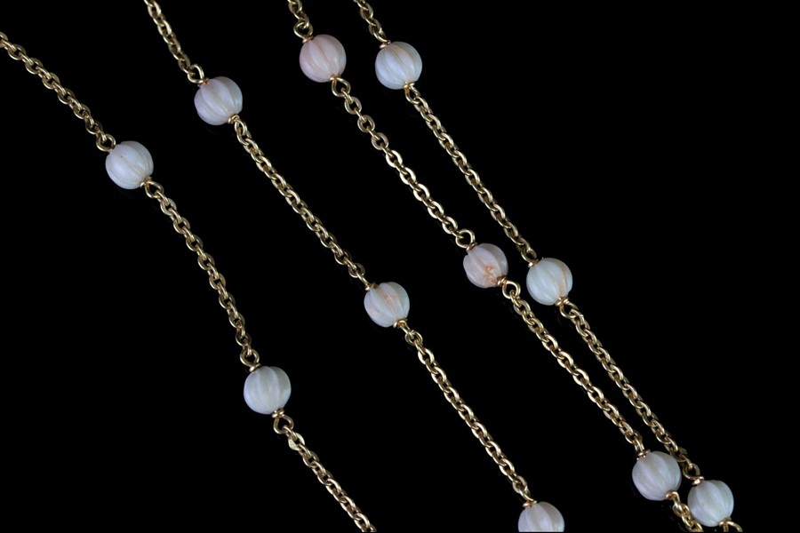 Carved coral bead necklace, 24 carved pale white/pink coral beads, gold belcher chain, stamped and - Image 2 of 2