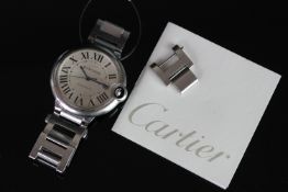 GENTLEMEN'S CARTIER BALLON BLEU WRISTWATCH W/ SPARE LINK & BOOKLET, circular silver dial with