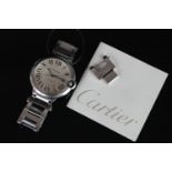 GENTLEMEN'S CARTIER BALLON BLEU WRISTWATCH W/ SPARE LINK & BOOKLET, circular silver dial with