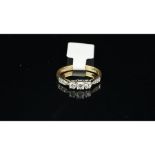 A cubic zirconia ring, set in yellow metal, ring size L, approximate weight 2.1 grams.