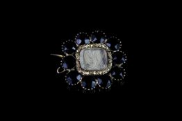 MOURNING BROOCH SET WITH JET CIRCA 1830.9ct not hallmarked, with memory inscription on back, total