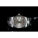 GENTLEMEN'S ROLEX OYSTERDATE PRECISION WRISTWATCH, circular silver dial with silver baton hour