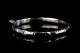 EARLY 20TH 9CT BAMBOO BANGLE,hollow, no hallmark , total weight 12gms.