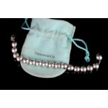 Tiffany & Co bracelet w/ pouch, silver ball bead bracelet, hallmarked sterling silver, approximate