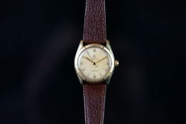 GENTLEMEN'S Rolex 10CT GOLD BUBBLE BACK WRISTWATCH REF. 6085, circular patina dial with gold hour