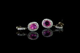 Pair of Pink Sapphire and Diamond earrings, set with 2 oval cut pink sapphires totalling 1.64ct,