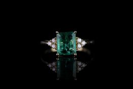 Emerald and Diamond ring, set with 1 emerald totalling 1.34ct, 4 claw set, 6 round brilliant cut