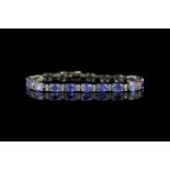 Tanzanite and Diamond bracelet, set with 19 oval cut tanzanites totalling 15.10ct, surrounded by