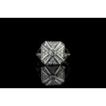 Diamond cluster ring, set with 1 round brilliant cut diamond totalling 0.15ct, surrounded by 20