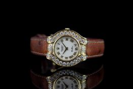 LADIES 18K ROLEX CELLINI DIAMOND SET BEZEL CIRCA 1990,round, white dial with gold hands, gold