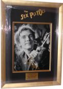 John Lydon, 16x12 photo signed in gold by John Lydon from the Sex Pistols. Profesionally framed