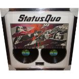 Status Quo, Double record sleeve signed by Parfitt and Rossi. Complete with signing details.