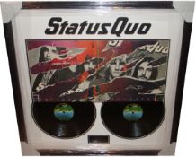 Status Quo, Double record sleeve signed by Parfitt and Rossi. Complete with signing details.