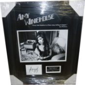 Amy Winehouse, Index card signed by Amy Winehouse. Autograph obtained at Camden - Market 2007.