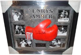 Henry Cooper, Boxing Glove signed by Sir Henry Cooper. Framed in a superb 3D Dome Presentation.