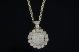 Diamond cluster pendant, heavy diamond set circular pendant, bombe set diamond centre, 14 clusters