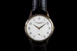 GENTLEMANS VINTAGE 9CT IWC, round,white dial with gold hands, gold arabic markers,second dial at 6 o