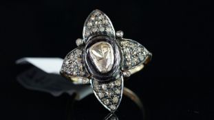 Large fancy shaped diamond cluster ring, mounted in silver on gold, central fancy shaped diamond