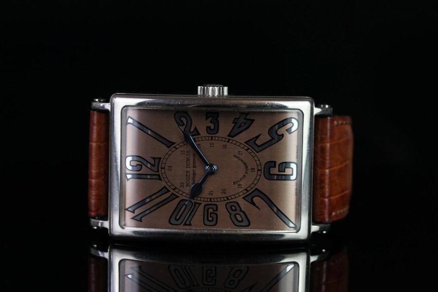 GENTLEMEN'S ROGER DUBUIS MUCH MORE WRISTWATCH, rectangular salmon dial with arabic numbers, 30mm