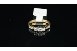 A cubic zirconia ring, set in yellow metal, ring size L, approximate weight 2.1 grams.