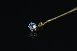 9CT BLUE TOPAZ ROUND SINGLE STONE PENDANT,stone estimated 6.6mm, 46cm chain,stamped 9k.