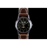 GENTLEMANS ZODIAC,round, black dial with illuminated hands, gold baton markers,day-date at 12 o