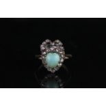 Diamond and turquoise ring circa early 20th century, set with heart shaped turquoise, surrounded