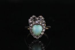 Diamond and turquoise ring circa early 20th century, set with heart shaped turquoise, surrounded