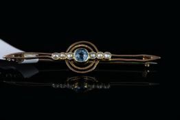 Aquamarine and pearl brooch, 1 aquamarine set to the centre, total of 6 pearls set either side,