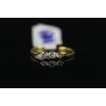 18CT THREE STONE DIAMOND RING,estimated total weight 0.15ct old cuts,stamped 18k and platinum, total