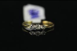 18CT THREE STONE DIAMOND RING,estimated total weight 0.15ct old cuts,stamped 18k and platinum, total