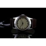 GENTLEMEN'S BAUMER AND MERCIER AUTOMATIC BUMPER WRISTWATCH, circular patina gilt minute track dial