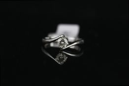 18K SINGLE STONE DIAMOND RING ESTIMATED 0.25CT ,not hallmarked stamped 750,estimated colour L