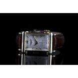 GENTLEMANS 14K LONGINES DRESS WATCH,oblong,white dial with gold hands,gold hour markers,30 x 20 mm