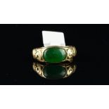 Rare Chinese jade ring, oval green jade measuring 10.8 x 7.22mm, with ornate carved dragons to