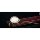 Cameo stick pin, mounted in unmarked yellow metal, oval cameo of a gentleman rub-over set to the