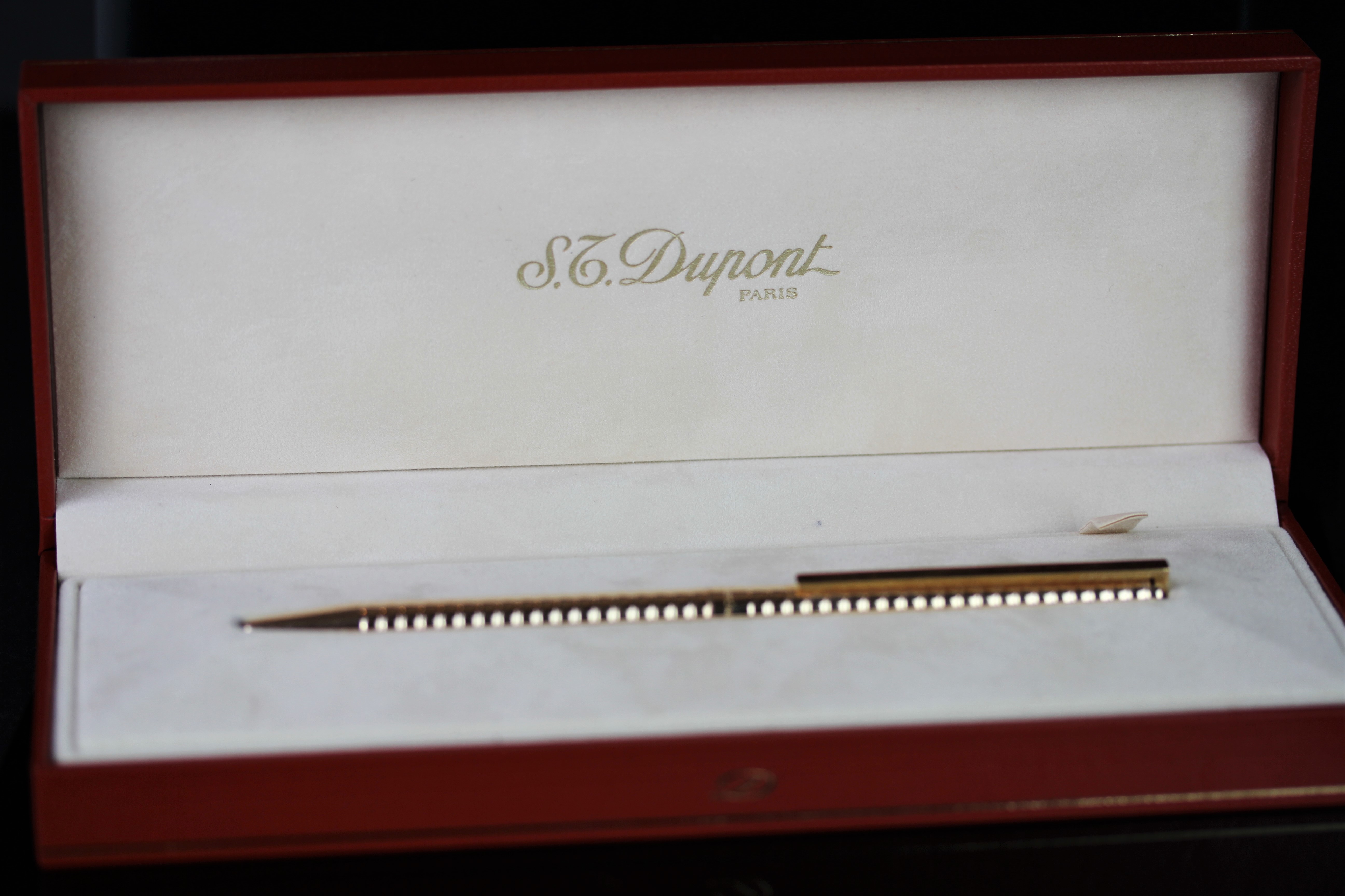S.T. DUPONT PARIS GOLD PLAQUE PENS W/ BOX AND PAPERWORK, the pen is roughly 13.5cm in length and
