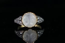 Moonstone and diamond ring, 1 moonstone set to the centre, total of 16 diamonds set to the