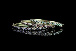 Group of 3 Ruby, Sapphire, Emerald & Diamond set bangles, bangle 1 - set with 12 rubies and 7