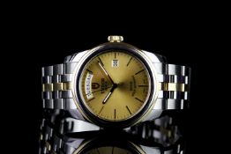 GENTLEMANS TUDOR GLAMOUR WATCH MODEL 56003,round, gold dial with illuminated hands, gold baton
