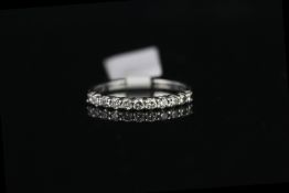 9CT WHITE GOLD DIAMOND ETERNITY RING,11 stones estimated total weight 0.40ct, size S.