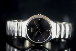 GENTLEMENS RADO JUBILE W/ BOX, PAPERS & SPARE LINKS, circular black dial with diamond hour