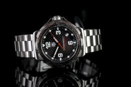 GENTLEMENS TAG HEUER FORMULA 1 DATE WRISTWATCH REF. WAH1105, circular carbon fibre dial with