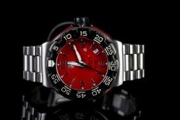 GENTLEMENS TAG HEUER FORMULA 1 DATE WRISTWATCH REF. WAC1113-0, circular red dial with silver hour
