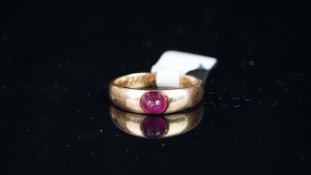 Victorian cabochon ruby dress ring, single tall cabochon cut ruby, 5.3x4.7x4.26mm, set within a rose