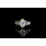 18CT MARQUISE CUT DIAMOND RING,WTH BAQUETTE SHOULDERS, centre stone estimated 1.00ct, total weight