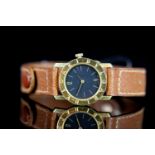 LADIES 18CT BVLGARI,round, grey dial with gold hands, gold baton markers, date aperture at 6 o