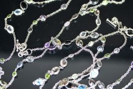 2X SILVER NECKLETS SET WITH 91 SEMI PRECIOUS STONES COMBINED, not hallmarked, total weight 72 gms.